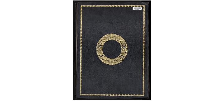 Back Cover- Decorative patterns embossed in gold on black leather. The influ